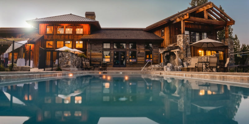 A house with swimming pool in its backyard