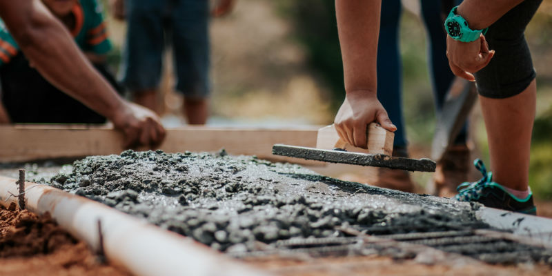 Workers building a home