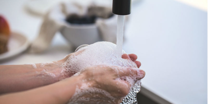 Hot water coming out of a tap