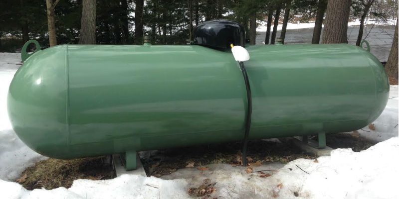 A propane tank in backyard