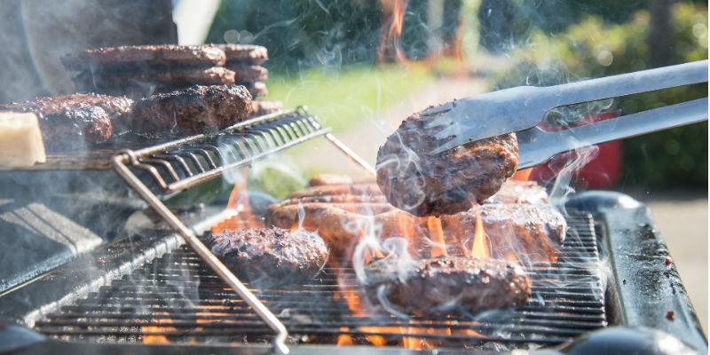 Person barbecuing food